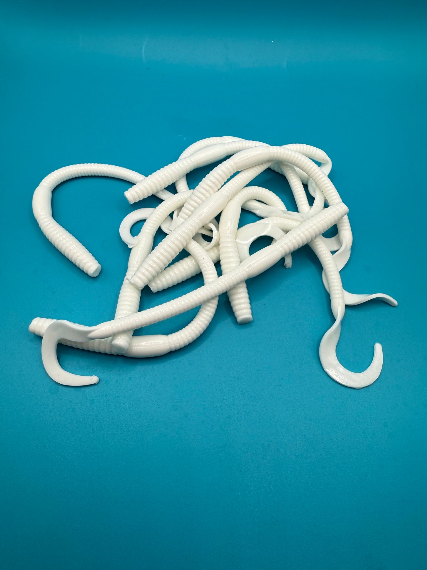 MEKENI'S STRIPER HALI WORM TAILS 10CT $5.99 Please Choose Options