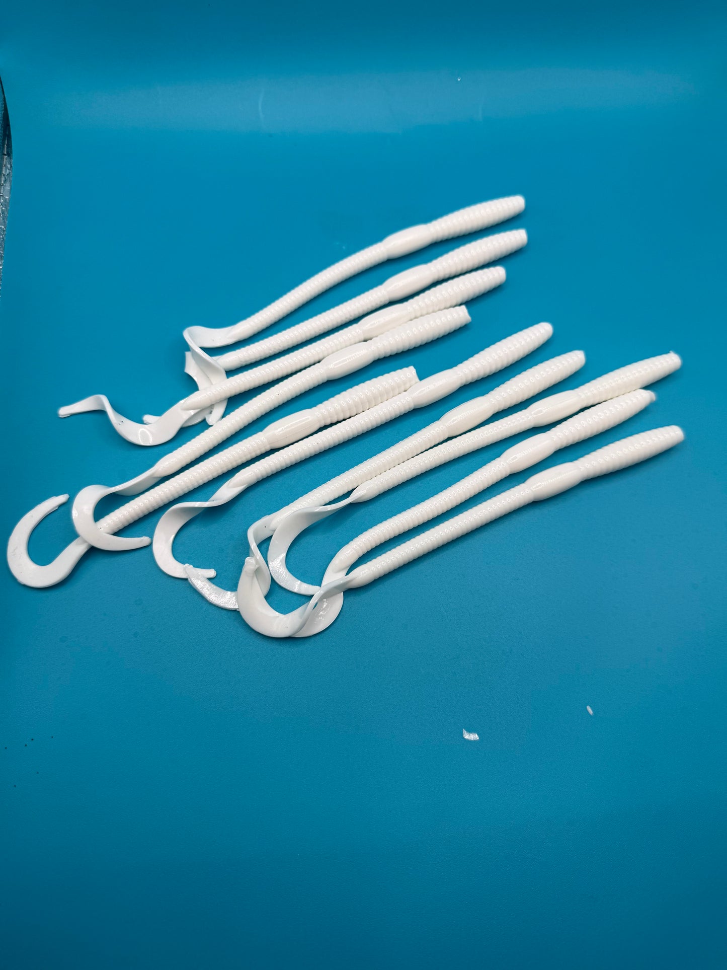 MEKENI'S STRIPER HALI WORM TAILS 10CT $5.99 Please Choose Options